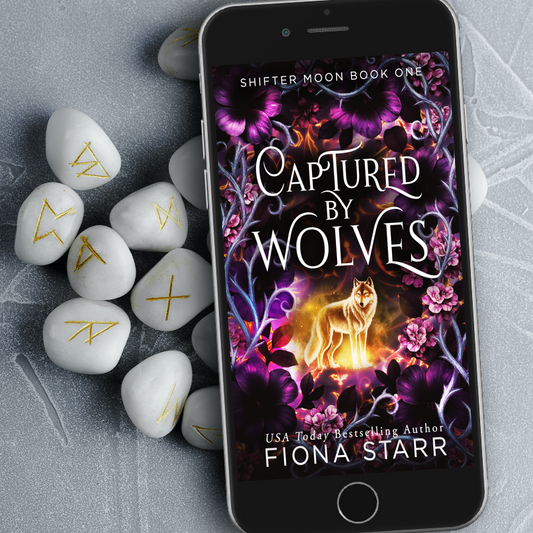 Captured by Wolves (Shifter Moon #1)